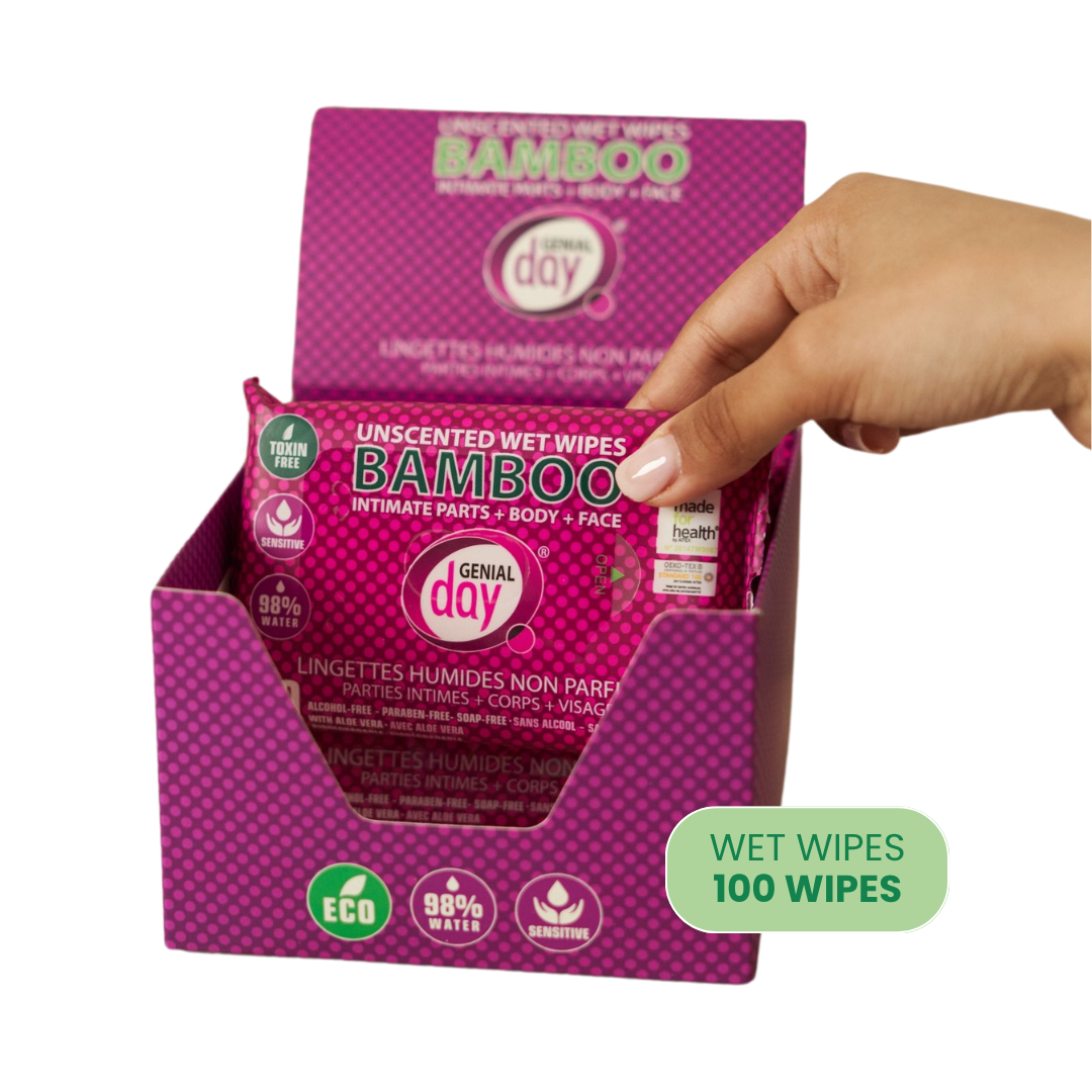 Box of Genial Day bamboo wet wipes with a hand reaching for one, on a white background